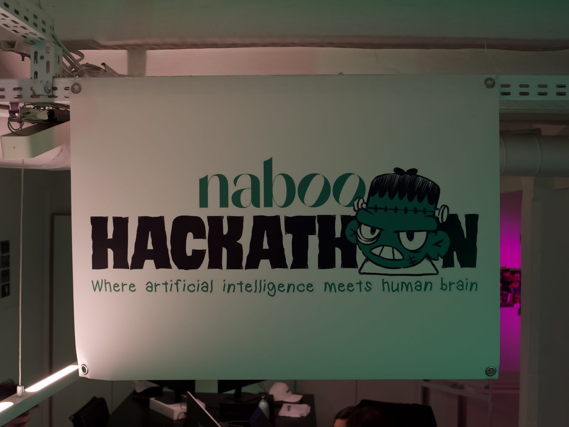 One of the hackathon team flags designed by Naboo Studio, with the line Where AI meets human brain