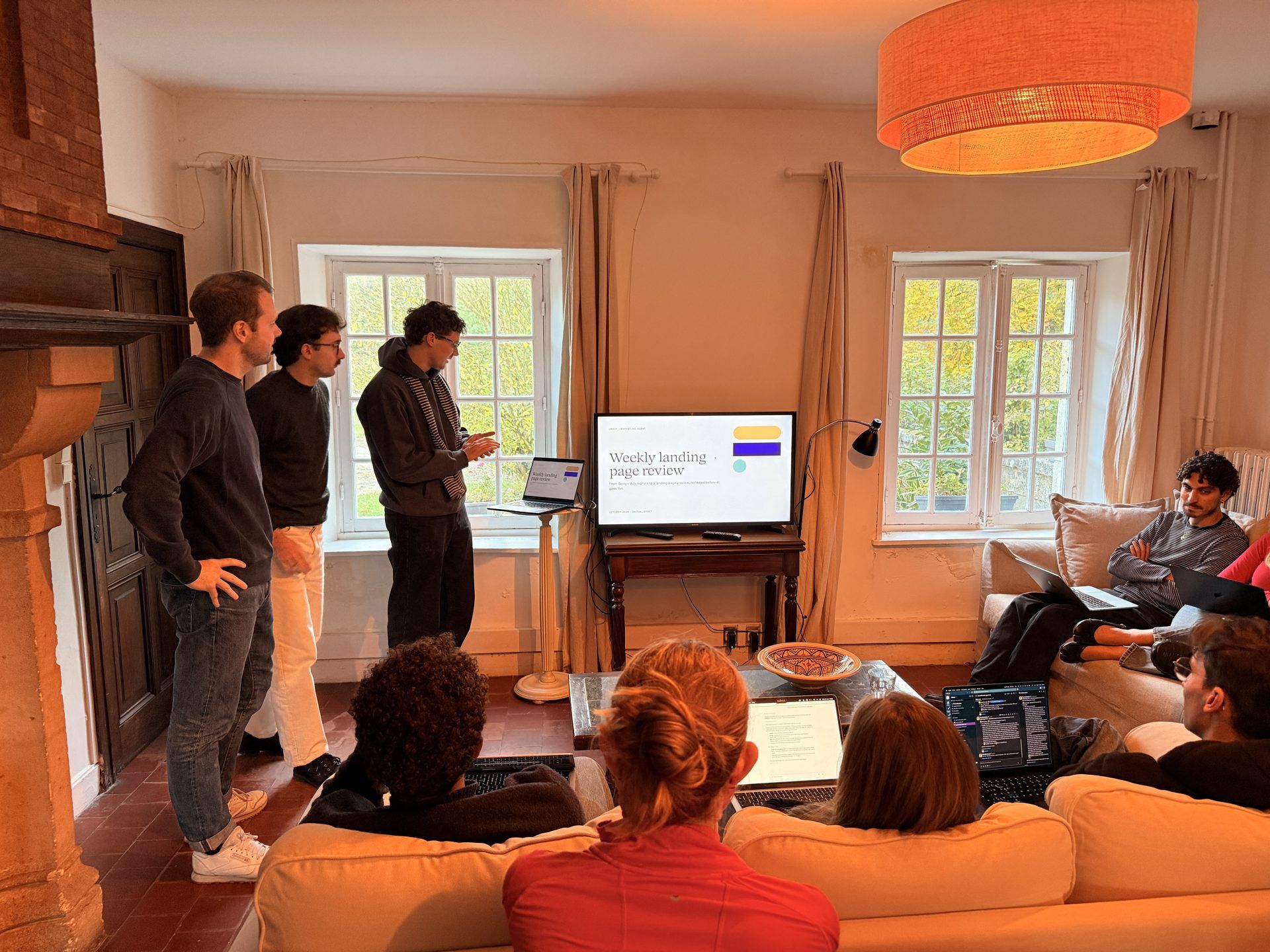 Naboo marketing team in an AI-native marketing workshop in the living room of Le Grand Sambam